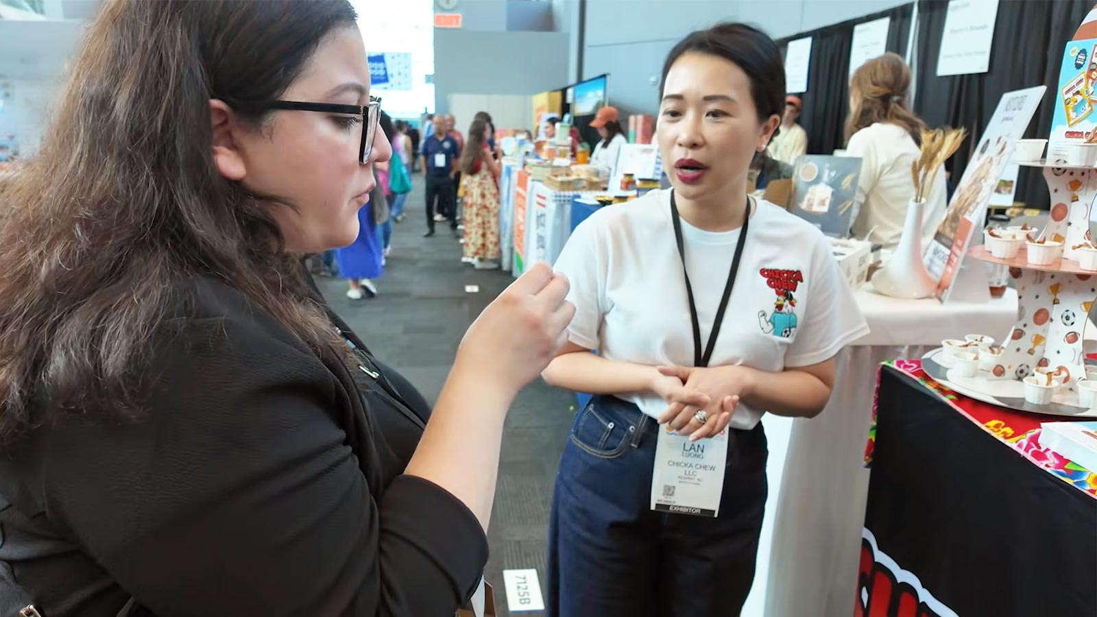 Chicka Chew Founder Lan Luong and Fancy Food Show attendee