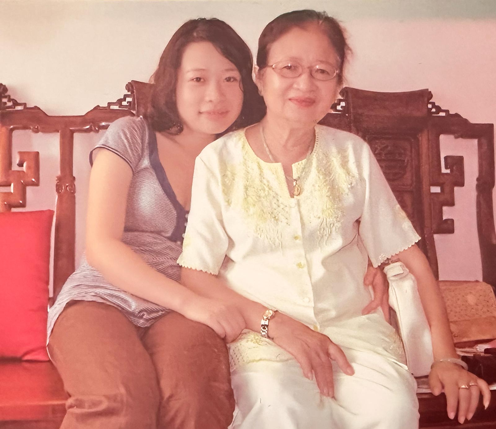 Young Lan with her loving grandma in Vietnam