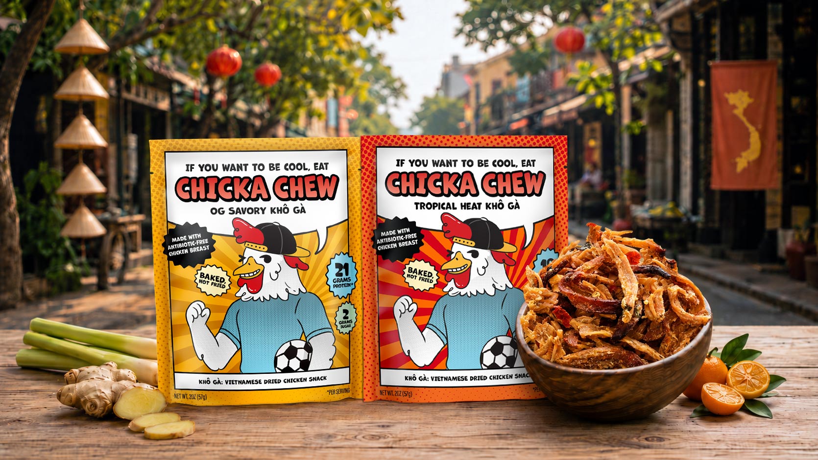 Two packages of Chicka Chew snacks on a wooden table with a street scene in Ha Noi in the background.